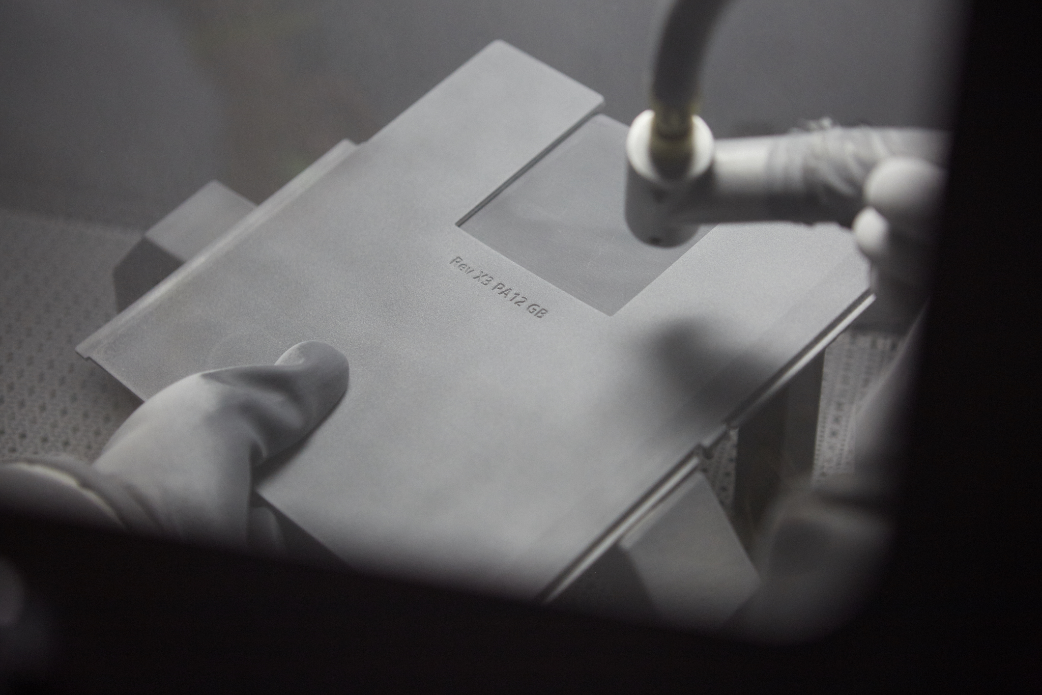 Sandblasting a 3D printed panel for the HP space station printer